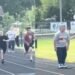 True Sportsmanship Shines as Younger Runner Helps Classmate