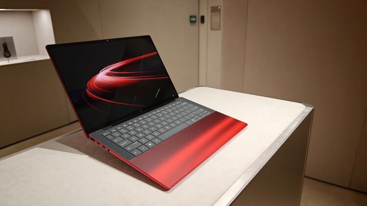 Ferrari And HP Made A Vivid Crimson Laptop computer With A Clear Base Panel