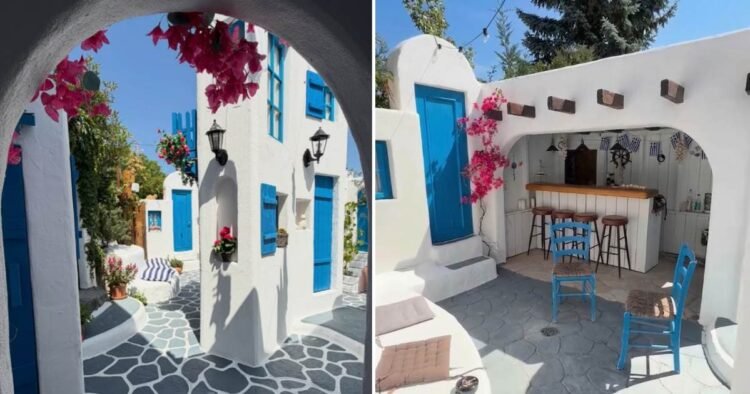 A person constructed a miniature Greek village in his yard